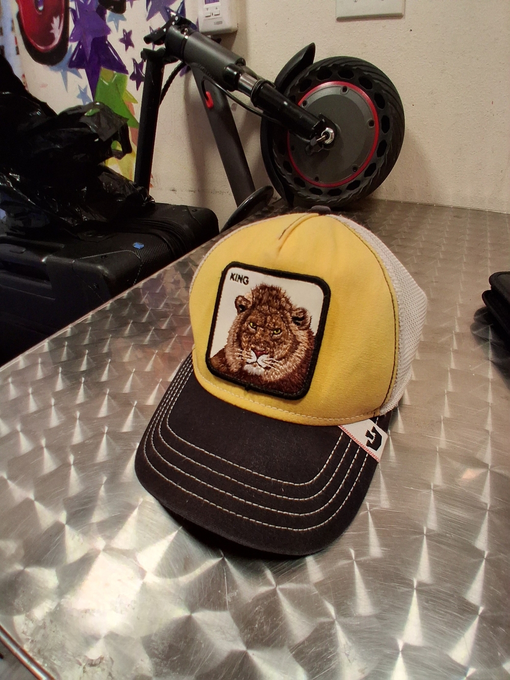 Yellow & Black Lion Patch Trucker Hat